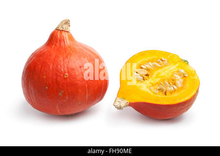 Whole and partial fresh orange Hokkaido pumpkin on white background Stock Photo