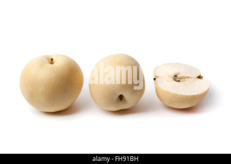 Whole and partial Nashi pear isolated on white background Stock Photo