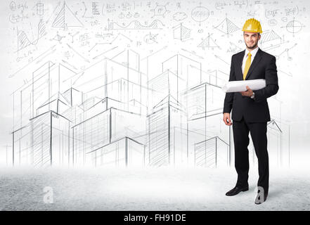 Handsome construction specialist with city drawing in background Stock Photo