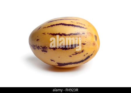 Whole single fresh ripe Pepino fruit on white background Stock Photo