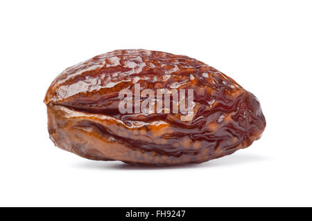 Whole single dried date on white background Stock Photo
