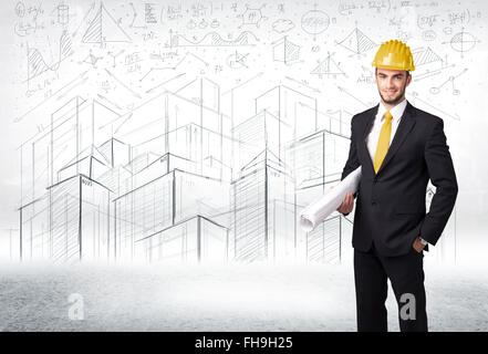 Handsome construction specialist with city drawing in background Stock Photo