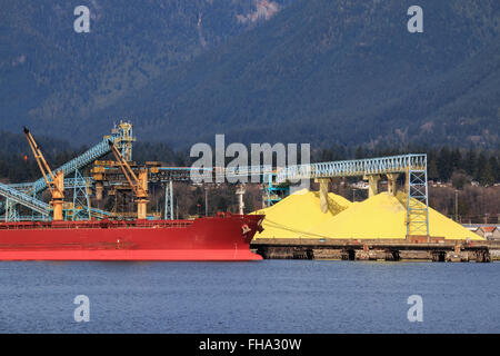 Large bulk carrier at Bulk Terminal in North Vancouver, BC, Canada. Stock Photo