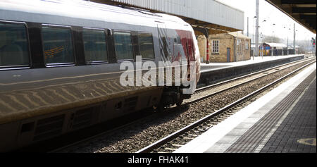 Virgin Voyager Diesel Train at Warrington Bank Quay catching the sun. Stock Photo