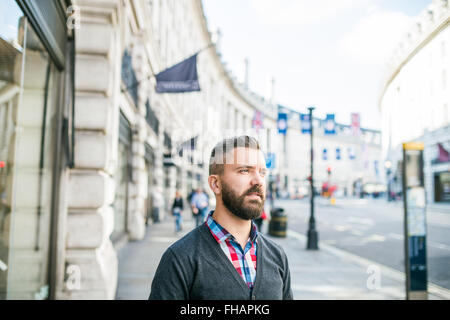 Hipster man in the streets of London, sunny day Stock Photo