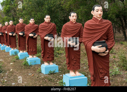 Row of statues of 500 Arahant disciples of Buddha at Win Sein, Mudon near Mawlamyine, Mon State, Burma - Myanmar Stock Photo