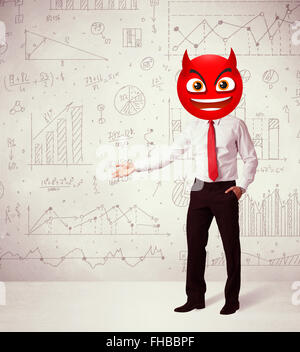 businessman wears devil smiley face Stock Photo