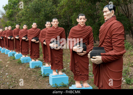 Row of statues of 500 Arahant followers of Buddha at Win Sein, Mudon near Mawlamyine, Mon State, Burma - Myanmar Stock Photo