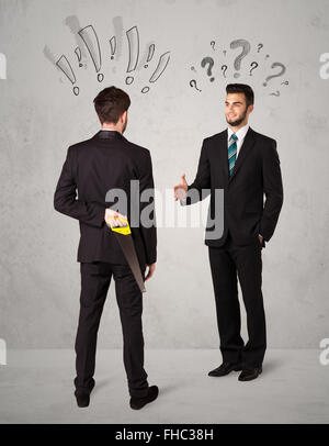 Ruthless business handshake Stock Photo