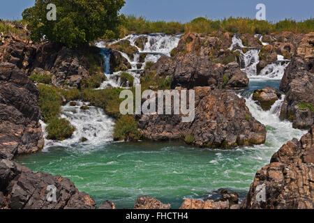 The TAM I DAENG WATERFALL is off the beaten track on the MEKONG RIVER in the 4 Thousand Islands Area (Si Phan Don) near DONE KHO Stock Photo