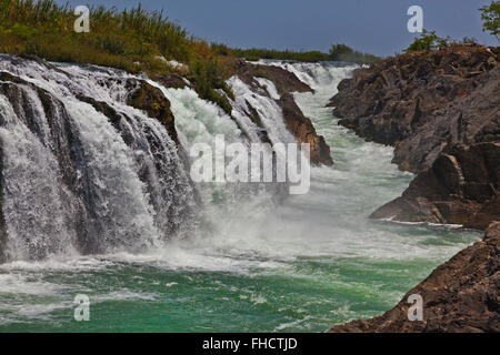 The TAM I DAENG WATERFALL is off the beaten track on the MEKONG RIVER in the 4 Thousand Islands Area (Si Phan Don) near DONE KHO Stock Photo