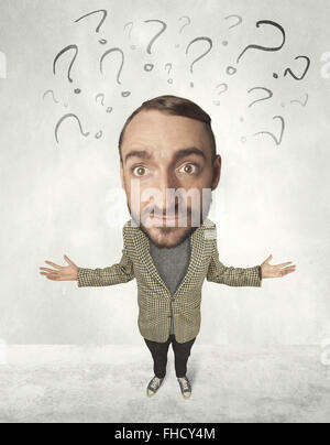 Big head person with question marks Stock Photo