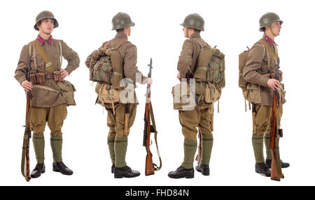 a young Soviet soldier with SVT rifle , front, profile, back Stock Photo