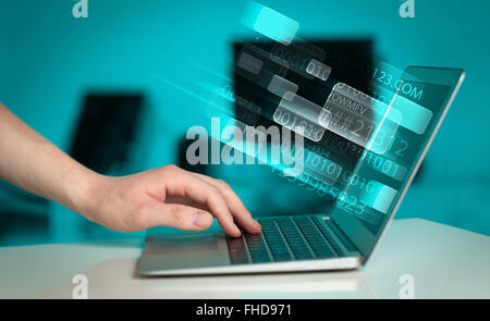 Close up of man typing on laptop computer Stock Photo