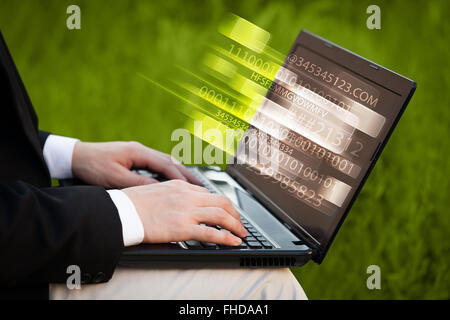 Close up of man typing on laptop computer Stock Photo