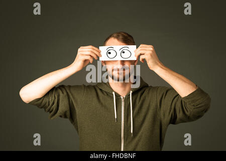 Silly man looking with hand drawn eye balls Stock Photo