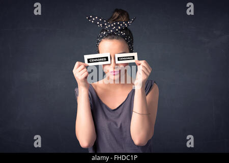 Pretty girl with censored paper sign Stock Photo
