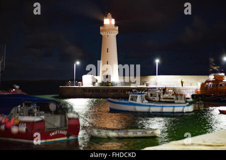 Donaghadee, UK. 25th February, 2016. The Lighthouse in Donaghadee where Blue Peter's Lindsey Russell will begin her Zorb Challenge to cross the Irish Sea Credit:  Bonzo/Alamy Live News Stock Photo