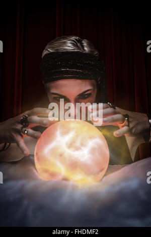 Composite image of fortune teller forecasting the future Stock Photo