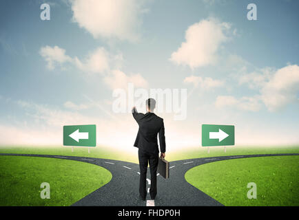 Businessman in front of a choice Stock Photo