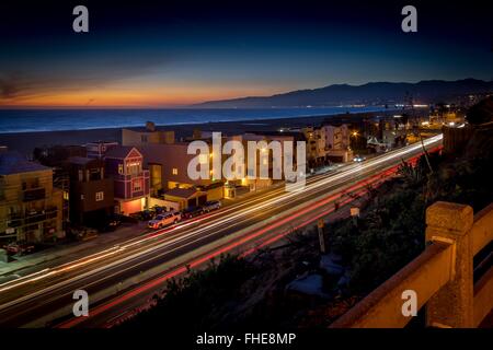 PCH, Pacific Coast Highway, Santa Monica - at sunset looking North to Malibu Stock Photo