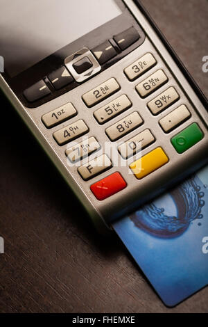 Color image of a POS and credit cards. Stock Photo