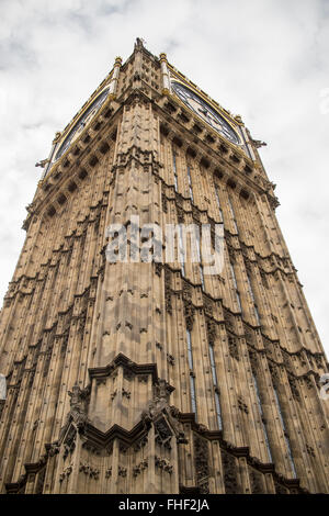 Looking up at Big Ben with cloudy sky above Stock Photo