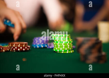 green roulette table with collored chips ready to play Stock Photo