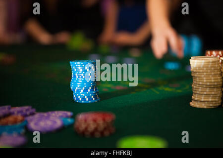 green roulette table with collored chips ready to play Stock Photo