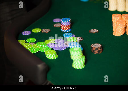 green roulette table with collored chips ready to play Stock Photo