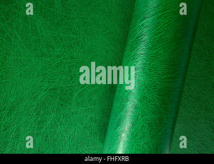 partly rolled full frame green leather surface Stock Photo