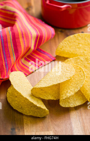 crispy taco shells on kitchen table Stock Photo