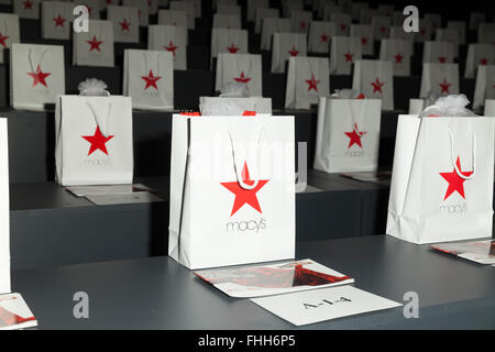 NEW YORK, NY - FEBRUARY 11, 2016: Goody bags on runway for the Heart Truth Red Dress Collection 2016 fashion show at Moynihan Station Stock Photo