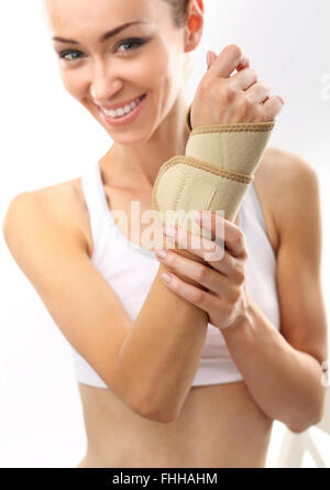 Compression joint stabilizer hand. Wrist, hand joint sprain. Injury pond palm, wrist injury Stock Photo