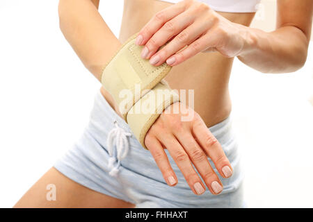 Compression joint stabilizer hand. Wrist, hand joint sprain. Injury pond palm, wrist injury Stock Photo