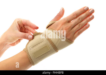 Compression joint stabilizer hand. Wrist, hand joint sprain. Injury pond palm, wrist injury Stock Photo