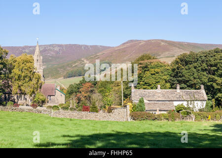 Church and cottage in the village of Edale with Kinder Scout rising up behind. Edale, Derbyshire, Peak District National Park, England, UK Stock Photo