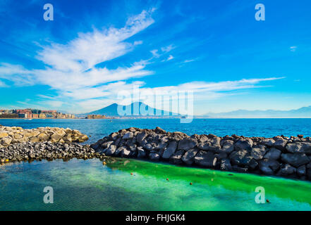 Morning view of Gulf of Naples with blue sky ,Mediterranean sea and Vesuvius Volcano at the background Stock Photo