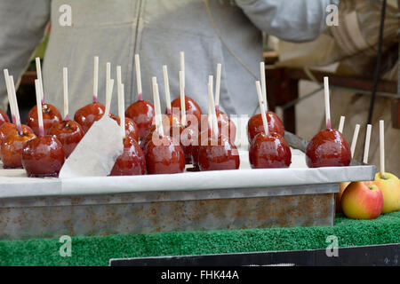 Toffee Apples on display at stall for people to buy Stock Photo