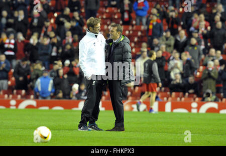 Liverpool, UK. 25th February, 2016. Augsburg's head coach Markus Weinzierl (r) talks to Liverpool's head coach Juergen Klopp prior to the UEFA Europa League round of 32, second leg soccer match between Liverpool FC and FC Augsburg in Anfield, Liverpool, England, on 25 February 2016. Credit:  dpa picture alliance/Alamy Live News Stock Photo