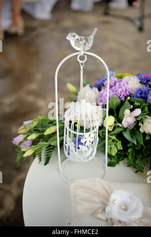 Wedding decor, white with a bird cage Stock Photo