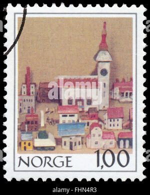 BUDAPEST, HUNGARY - 21 february 2016: a stamp printed in the Norway shows wooden houses, circa 1978 Stock Photo