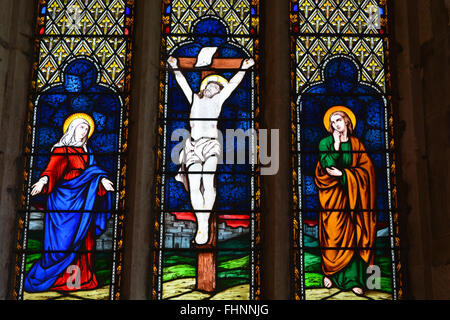 Stained glass window depicting Jesus on the cross, Holy Trinity Church, Weston, Hertfordshire Stock Photo