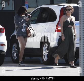 Vanessa Hudgens and sister Stella Hudgens leave Sugarfish sushi