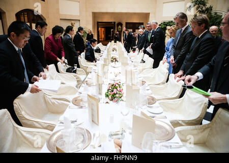 Berlin, Germany. 25th Feb, 2016. Chinese Commerce Minister Gao Hucheng (6th L, front) meets with representatives of Federation of German Industries (BDI) in Berlin, capital of Germany, on Feb. 25, 2016. Chinese Commerce Minister Gao Hucheng said on Thursday that economic and trade cooperation between China and Germany was in good momentum in recent years, both sides should make joint efforts to gain more achievements. © Zhang Fan/Xinhua/Alamy Live News Stock Photo