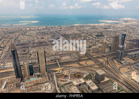 Dubai, United Arab Emirates - Dec 2, 2014: Aerial shot of Sheik Zayed with the  Financial Road and the World Islands in Dubai. T