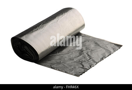 Roll of black litter bag isolated on the white background Stock Photo