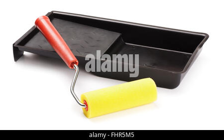 New paint tray and roller isolated on white background Stock Photo
