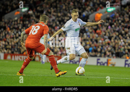 Liverpool, UK. 25th February, 2016. Europa League, knockout tie,for editorial use only   left Alberto Moreno (Liverpool FC) 18 and Dominik Kohr ( FC Augsburg ) 21  Credit:   Burghard Schreyer/Alamy Live News Stock Photo