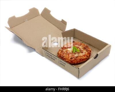 Mini Pizzas isolated on a kitchen bench Stock Photo